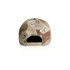 A camouflage cap in shades of tan, brown, and green, featuring a snapback closure and a small logo.