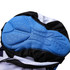 Close-up of blue padded interior of men's sublimated cycling bib tights with black outer fabric and a logo.