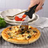A stainless steel pizza cutter with a black handle cutting into a pizza topped with olives and cheese.