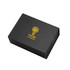 A black magnetic gift box with a logo in yellow. The box is rectangular and has a sleek design.