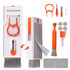 An 11-in-1 cleaning kit in white and orange, including brushes, a spray bottle, and various cleaning accessories.