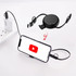 A retractable portable charging cable in black, connected to a smartphone, showcasing its compact design and functionality.