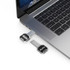 A silver Auto LED flash drive plugged into a laptop, featuring a sleek design and a logo.