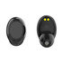 Wireless earbuds in black featuring a sleek design and logo, with a charging area on the underside.