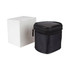 A black travel adaptor case with a textured finish, accompanied by a plain white box.
