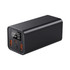 A black power bank with multiple USB ports and a digital display, showing battery level and output specifications.