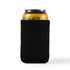 A drink can is wrapped in a sleek black stubby cooler, designed to keep beverages cool.