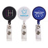 A set of three retractable name badge holders in black, white, and blue, each featuring different logos.