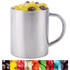 A silver mug filled with assorted jelly beans in vibrant colors, including yellow and purple.