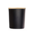 A large black glass candle with a natural wood lid. The candle features a sleek, modern design.