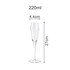 A clear tulip champagne glass, measuring 27 cm tall and 4.4 cm wide, with a sleek and elegant design.