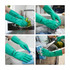 A set of reusable cleaning nitrile gloves in vibrant green, used for various cleaning tasks in different settings.