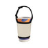 A drink bottle sleeve in cream with a black strap, holding a patterned disposable cup.