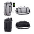 A grey and black convertible bucket backpack duffel bag with adjustable straps and a USB charging port.