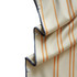 A beige hooded change towel with orange vertical stripes and snap fasteners along the edge.
