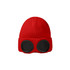 A red beanie featuring black goggles on the front, showcasing a ribbed texture and fold-over cuff.