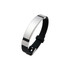 A sleek black and silver metal bracelet featuring a smooth design and a secure clasp. The product has a logo.