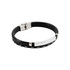 A black leather bracelet featuring a silver metal clasp and an engraved rectangular plate.