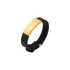 A black bracelet with a shiny gold centrepiece and a clasp, featuring a logo on the strap.