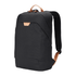 A black backpack with a leather accent, featuring padded shoulder straps and a logo on the front.