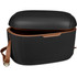 A black cooler box with a brown strap and a hinged lid, featuring a smooth exterior and spacious interior.