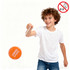 A young boy with curly hair plays with an orange yoyo. The product has a logo and a white string attached.