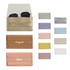 A collection of PU leather glasses pouches in various colours, including gold, pink, lavender, and sky blue, with logos.