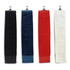 A set of four golf towels in black, navy, red, and white, each with a clip for attachment.
