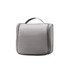 A grey hanging travel toiletry bag with a zip closure and a handle on top. It features a logo on the front.