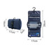 A navy folding travel toiletry bag featuring multiple compartments and a hook for hanging, measuring 39cm by 17cm.
