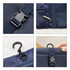 Navy folding travel toiletry bag featuring a clip closure, zip pocket, and a hook for hanging. Includes a logo.