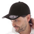 A black cap featuring a curved visor and an attached logo on the side.