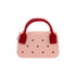 A pink mini handbag with red handles featuring circular holes along the front. It has a simple, stylish design.