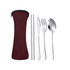 A maroon carrying case with stainless steel cutlery, including a knife, fork, spoon, and chopsticks.