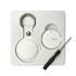 A white tracking tag and keyring, accompanied by a small screwdriver, displayed on a white background.