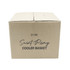 A tan cardboard box labelled "Saint-Rémy Cooler Basket," featuring branding on the front.