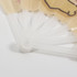 A plastic hand fan featuring a light yellow design with a clear handle and a logo.