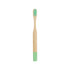 A bamboo toothbrush with a small round handle featuring a mint green bottom and soft bristles.