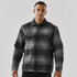 A men's black and grey plaid jacket with a Sherpa lining and two chest pockets, featuring a logo on the front.