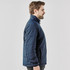 A navy blue puffer jacket with a collar, featuring a side profile view of a man wearing it.