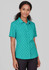 A short sleeve shirt in teal featuring a daisy print pattern and a button-up front. The model poses against a neutral background.