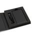 A black solid state power bank in a box with a USB cable, presented on a black foam insert.