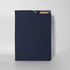 A navy blue A4 notebook with a textured cover, featuring a pocket for documents and a branding logo.