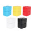 A set of universal travel adapters in blue, yellow, red, white, and black, stacked in pairs.
