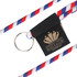 A red, white, and blue poly rope lanyard with a black attachment and a ring for holding items.