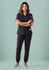 A black women's scrub top featuring a V-neck design, paired with matching black scrub pants and sneakers.