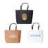 Three boutique paper bags in black, brown, and white, featuring various designs and logos.