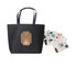 A black boutique paper bag with handles, accompanied by decorative stickers featuring various designs.