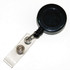 A round, black retractable card holder with a clear attachment for securing badges or ID cards.
