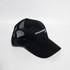 A black Snapback Truckers Cap featuring a mesh back and a logo on the front.